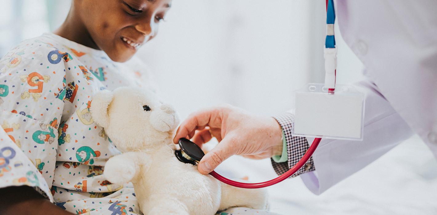 Girl and teddy bear